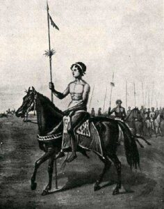 Guerriero Mapuche armato in abiti tradizionali
